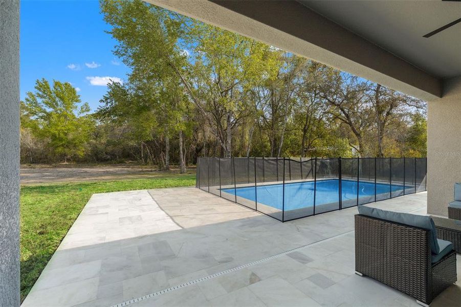 Exterior details and patio area of a home in , Spring Hill (Image 22).