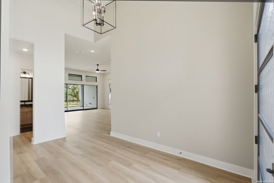 Spacious, unfurnished interior of a new home in Enchanted Bluff, San Antonio (Image 39).