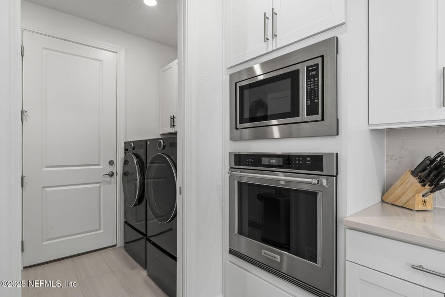 Furnished interior view inside a new home in Summer Bay at Grand Oaks, St. Augustine (Image 16). Furnished interior view inside a new home in Summer Bay at Grand Oaks, St. Augustine (Image 16).