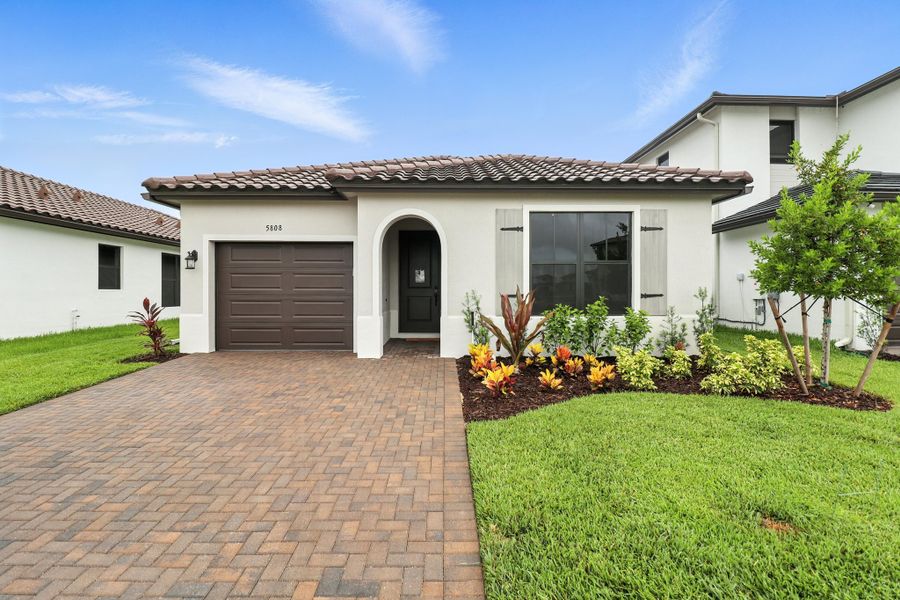 Front exterior of a home in the Maple Ridge community, located in Ave Maria, FL (Image 9). Front exterior of a home in the Maple Ridge community, located in Ave Maria, FL (Image 9).