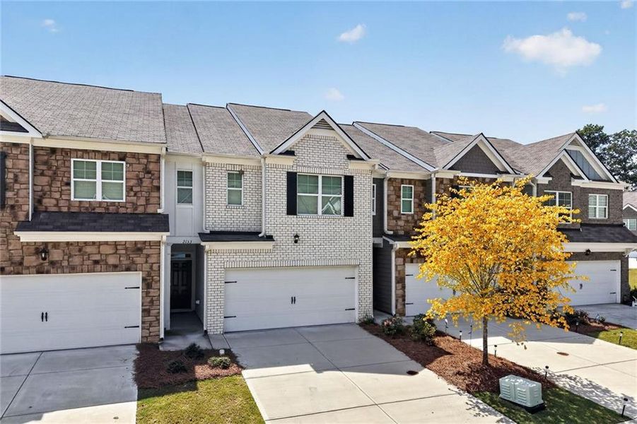 Front exterior of a new home in , Buford, GA, highlighting curb appeal (Image 20). Front exterior of a new home in , Buford, GA, highlighting curb appeal (Image 20).