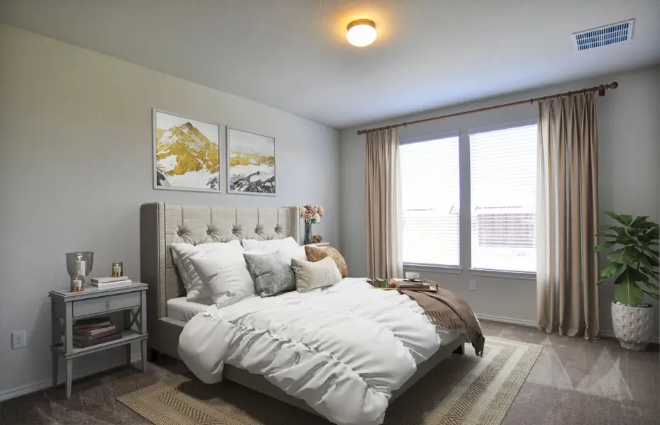 Owner's suite with large windows and private bath Owner's suite with large windows and private bath