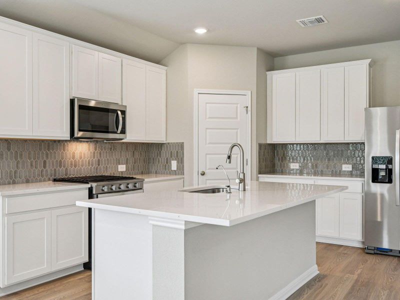 Photo is not of the actual home, but is an inspirational photo of builder’s model home and may depict options, furnishings, and/or decorator features that are not included