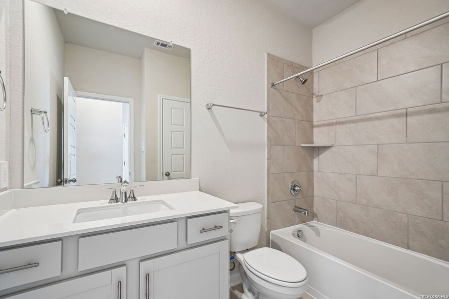 Furnished interior view inside a new home in Thomas Pond, San Antonio (Image 8).