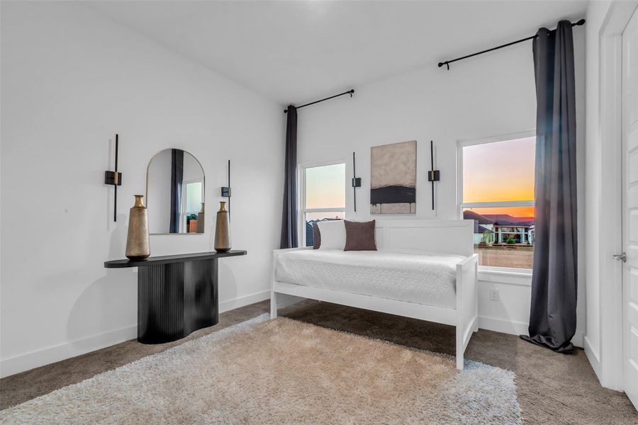 Bedroom Retreat:Awash in natural light and framed by sunset views, this refined retreat combines modern simplicity with serene comfort. Elevated by clean lines and curated accents, it offers a quiet space designed for both rest and inspiration.