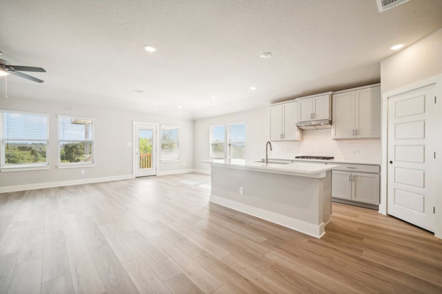 Kitchen in the Preston floorplan at a Meritage Homes community.