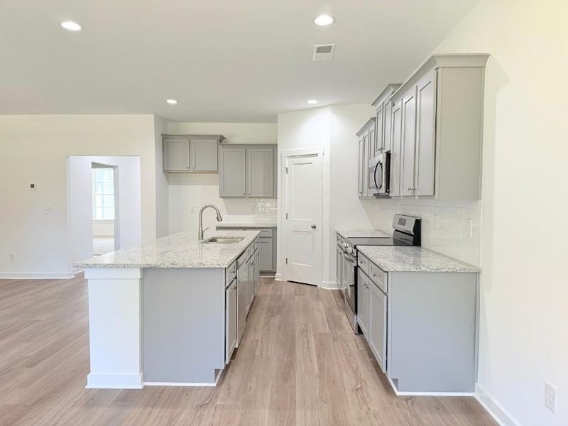 Furnished interior view inside a new home in Westlyn, Winder (Image 12).