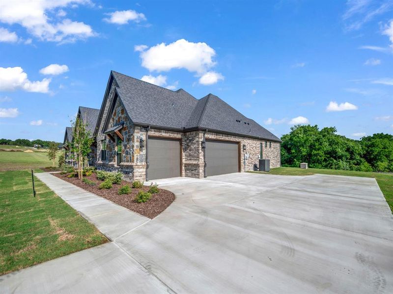 Front exterior of a new home in , Weatherford, TX, highlighting curb appeal (Image 28).