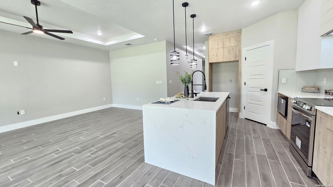 Furnished interior view inside a new home in , Atascosa (Image 7).
