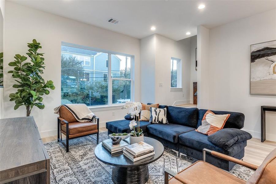 Living room featuring light hardwood / wood-style flooring