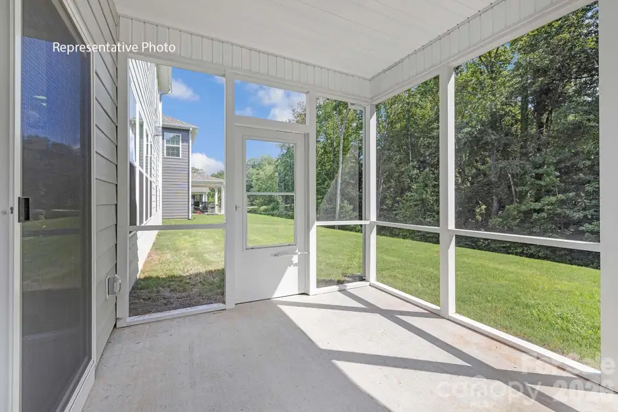 Exterior details and patio area of a home in Sylvan Creek, Denver (Image 27).