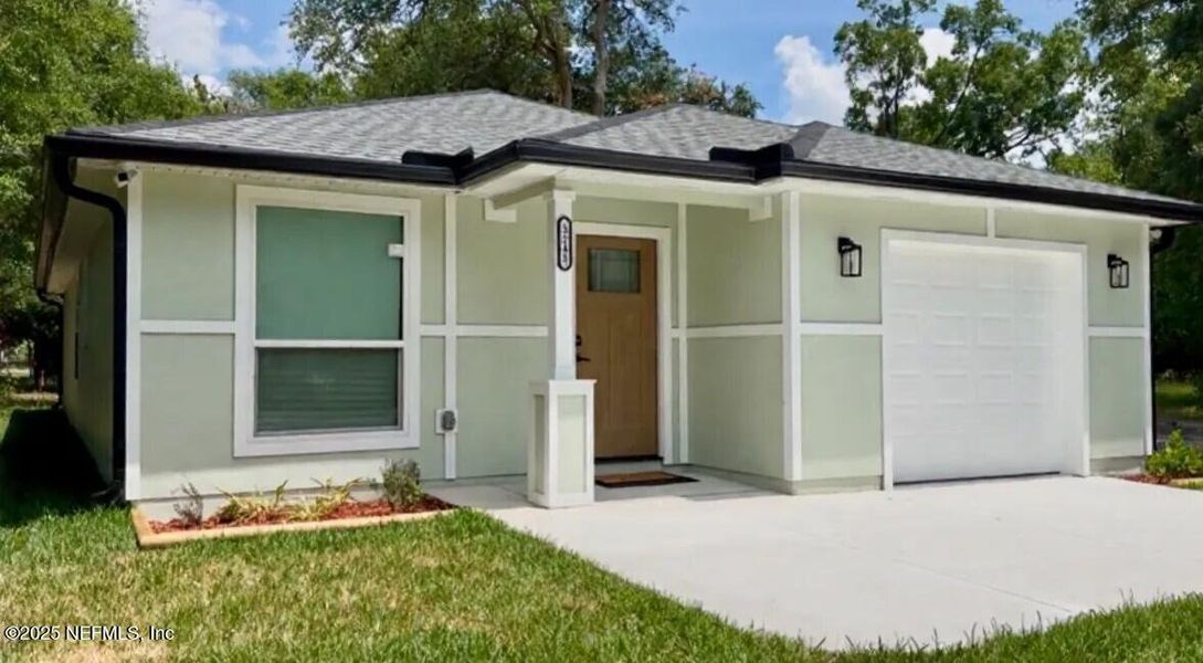 Front exterior of a new home in , Jacksonville, FL, highlighting curb appeal (Image 1). Front exterior of a new home in , Jacksonville, FL, highlighting curb appeal (Image 1).