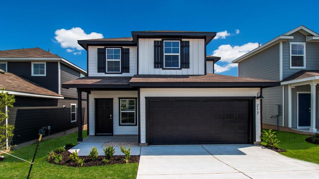 Front exterior of a new home in Wayside, Uhland, TX, highlighting curb appeal (Image 2). Front exterior of a new home in Wayside, Uhland, TX, highlighting curb appeal (Image 2).
