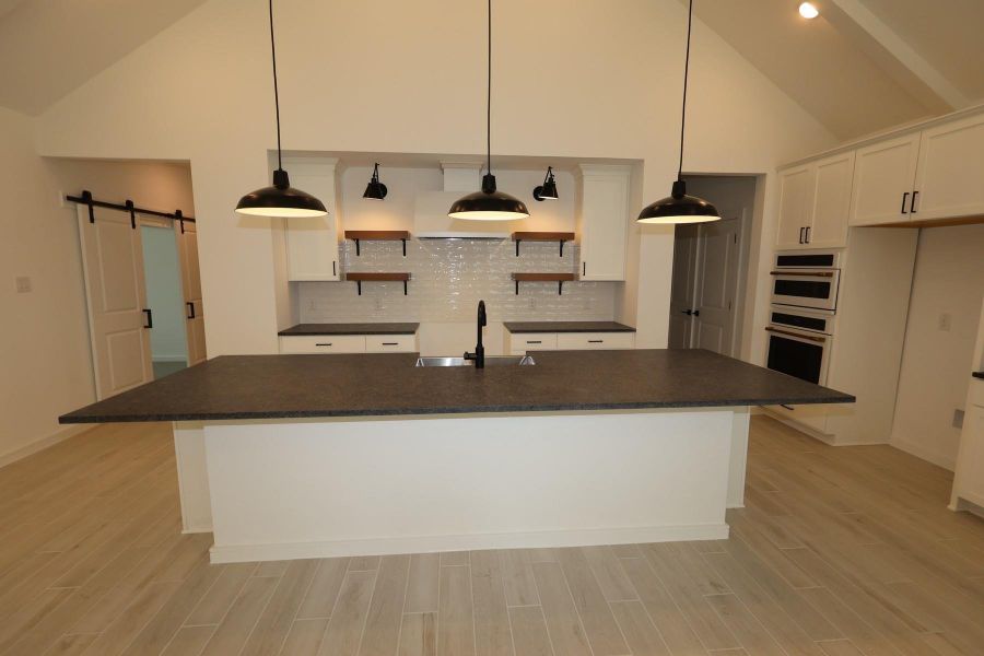 Furnished interior view inside a new home in Tarkington Timbers, Cleveland (Image 12).