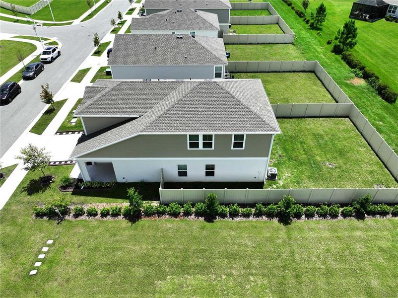 Front exterior of a new home in Pasadena Point, Wesley Chapel, FL, highlighting curb appeal (Image 21). Front exterior of a new home in Pasadena Point, Wesley Chapel, FL, highlighting curb appeal (Image 21).