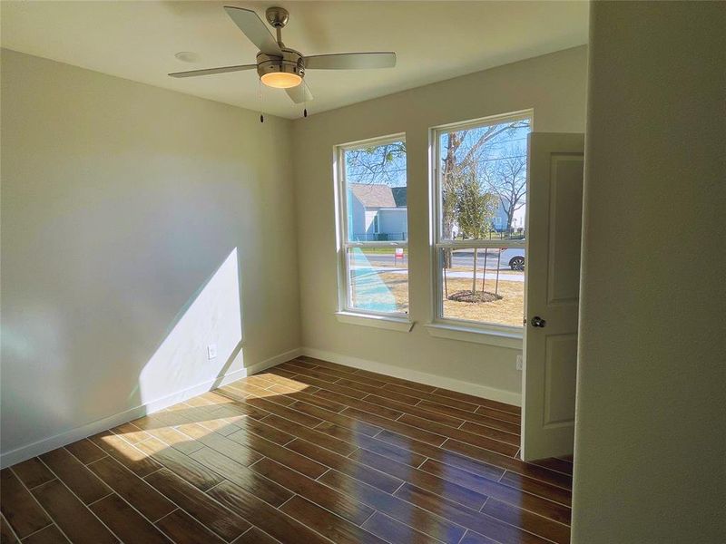 Unfurnished room featuring ceiling fan