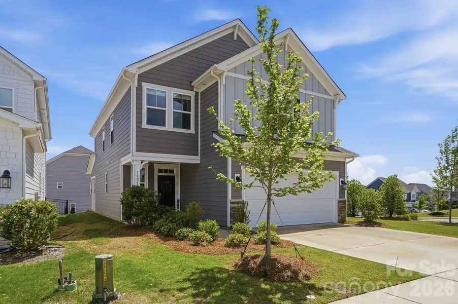 Front exterior of a new home in , Charlotte, NC, highlighting curb appeal (Image 23).