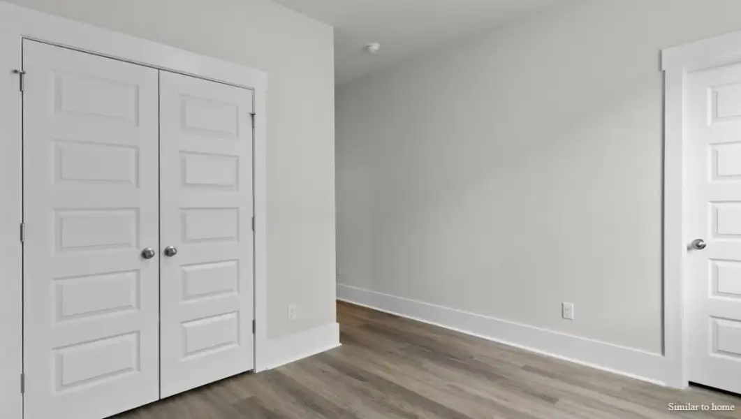 Spacious, unfurnished interior of a new home in The Highlands at Cedar Hill Landing, Navassa (Image 36).