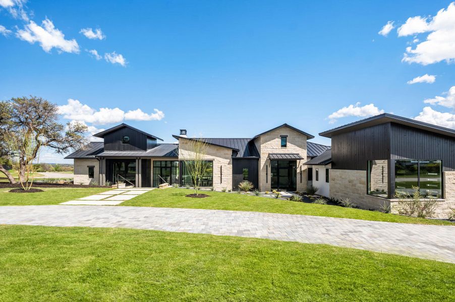 Front exterior of a new home in , Austin, TX, highlighting curb appeal (Image 2). Front exterior of a new home in , Austin, TX, highlighting curb appeal (Image 2).