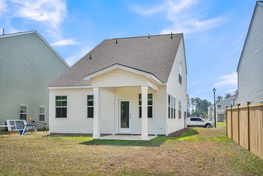 Exterior details and patio area of a home in Wildcat Chase, Summerville (Image 18).