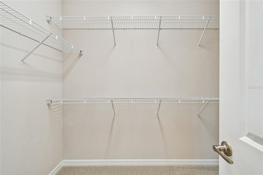 Spacious, unfurnished interior of a new home in Laureate Park at Lake Nona - Garden Series, Orlando (Image 24).