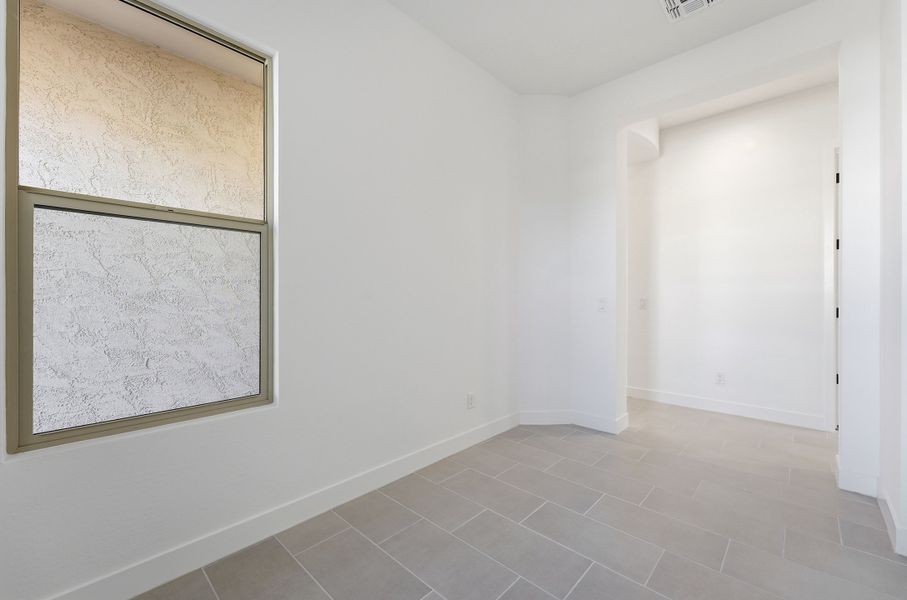 Spacious, unfurnished interior of a new home in Combs Ranch, San Tan Valley (Image 22).