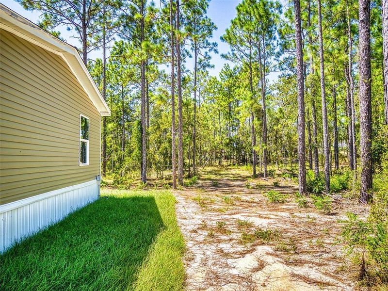 Exterior details and patio area of a home in , Williston (Image 23). Exterior details and patio area of a home in , Williston (Image 23).