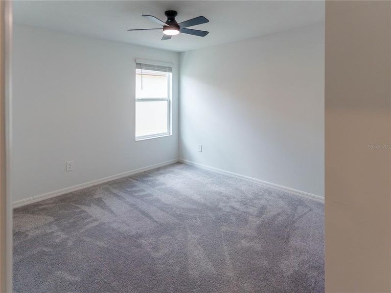 Spacious, unfurnished interior of a new home in The Isle of Avalon, Spring Hill (Image 25).