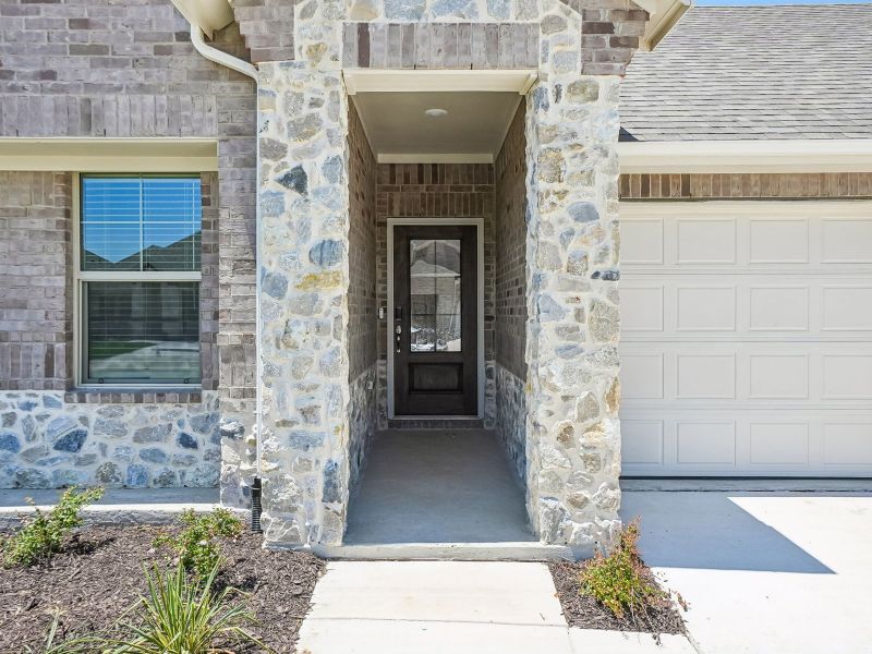 Exterior details and patio area of a home in Stella Hills, Denton (Image 3). Exterior details and patio area of a home in Stella Hills, Denton (Image 3).