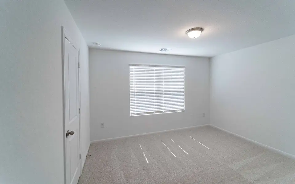 Spacious, unfurnished interior of a new home in Brooklands, Hutto (Image 12).