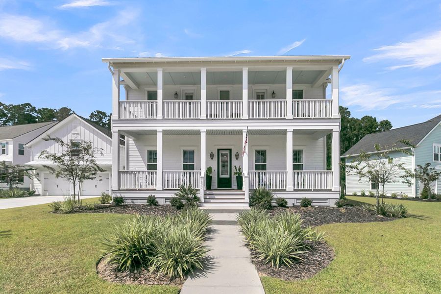 Front exterior of a new home in Carolina Park: Riverside, Mount Pleasant, SC, highlighting curb appeal (Image 23). Front exterior of a new home in Carolina Park: Riverside, Mount Pleasant, SC, highlighting curb appeal (Image 23).