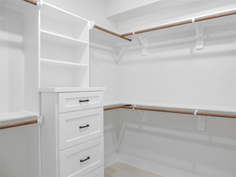 Other interior Pictures of a walk in closet built by Texas best home builders