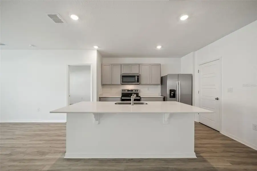 Furnished interior view inside a new home in , Tavares (Image 6).