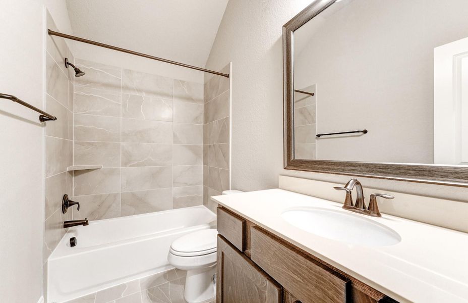 Furnished interior view inside a new home in The Woodlands Hills 65′, Willis (Image 15).