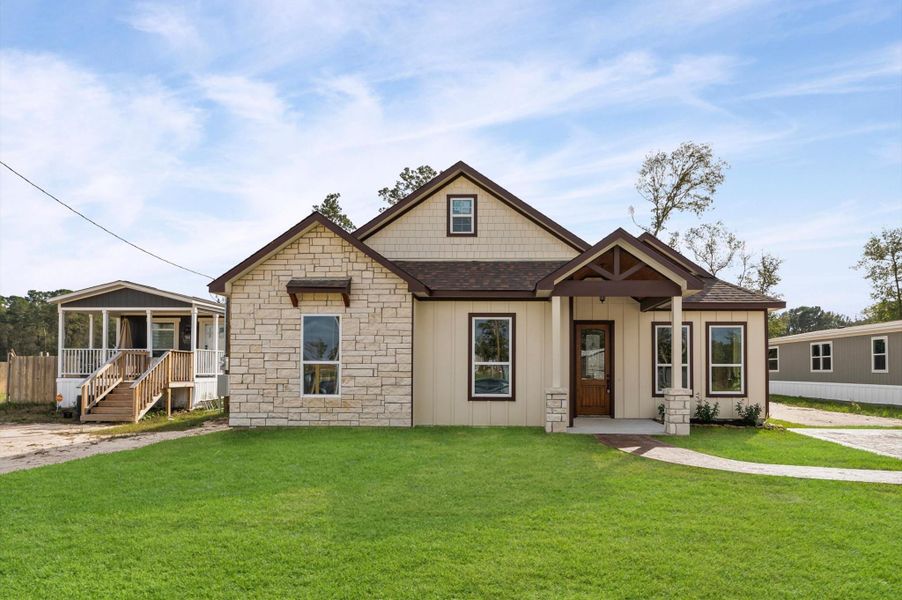 Front exterior of a new home in , Huffman, TX, highlighting curb appeal (Image 26).