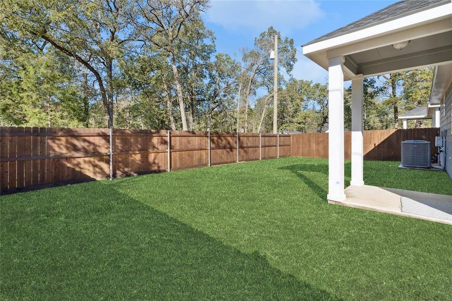 View of yard featuring cooling unit