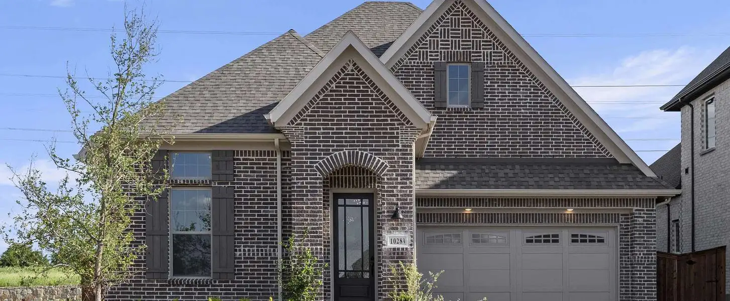 Representative exterior photo of a completed home built from the Farwell by Ashton Woods in Furst Ranch, Argyle, TX (Image 2). Representative exterior photo of a completed home built from the Farwell by Ashton Woods in Furst Ranch, Argyle, TX (Image 2).