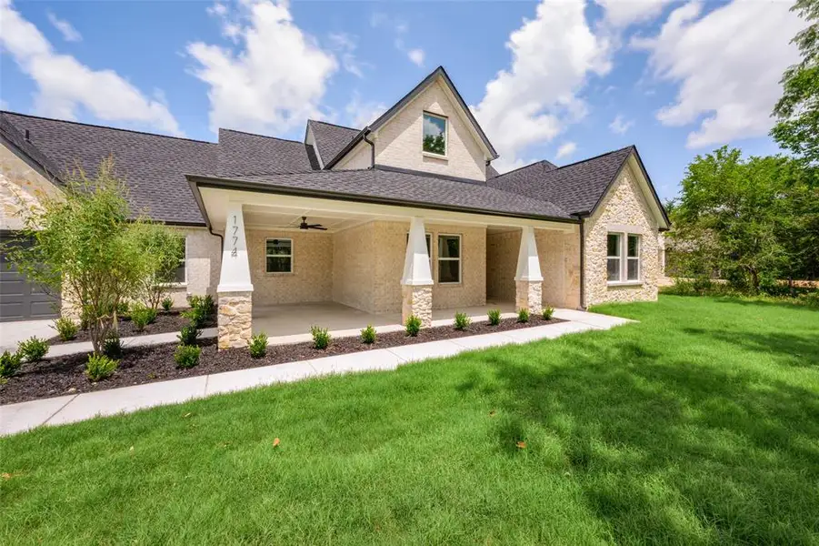 Front exterior of a new home in , Brashear, TX, highlighting curb appeal (Image 15). Front exterior of a new home in , Brashear, TX, highlighting curb appeal (Image 15).