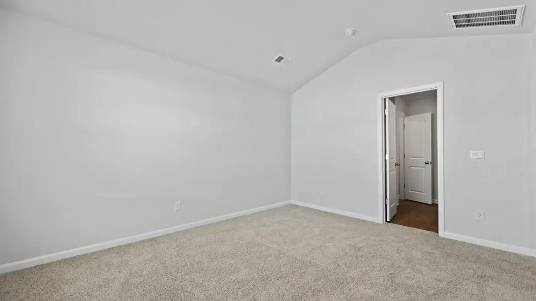 Spacious, unfurnished interior of a new home in Pine Hills Townhomes at Cane Bay, Summerville (Image 16). Spacious, unfurnished interior of a new home in Pine Hills Townhomes at Cane Bay, Summerville (Image 16).