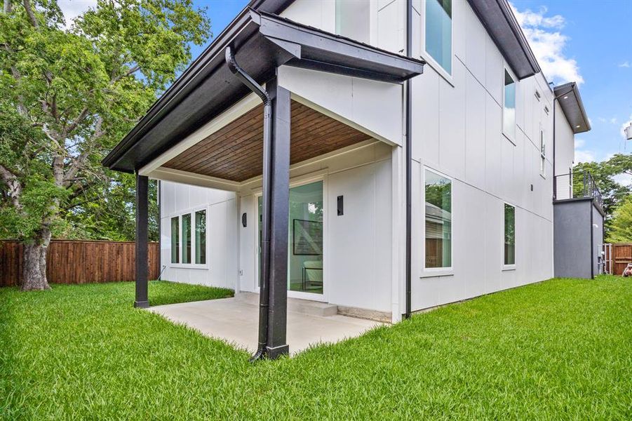 Back of property with a patio area