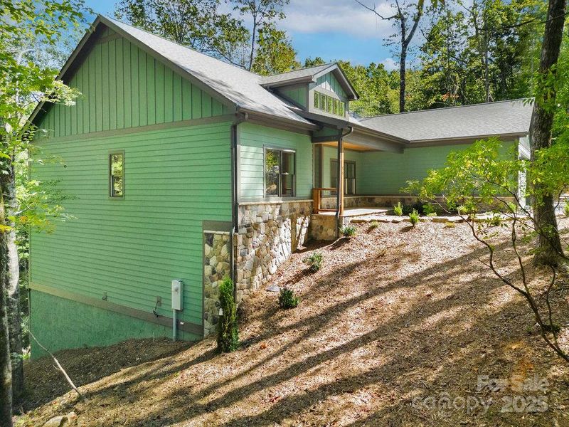 Front exterior of a new home in , Brevard, NC, highlighting curb appeal (Image 23).