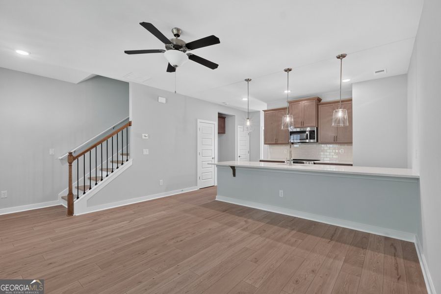 Spacious, unfurnished interior of a new home in The Cottages at East Lanier, Fayetteville (Image 11).