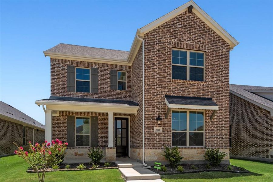 Front exterior of a new home in Arbors at Legacy Hills, Celina, TX, highlighting curb appeal (Image 16). Front exterior of a new home in Arbors at Legacy Hills, Celina, TX, highlighting curb appeal (Image 16).