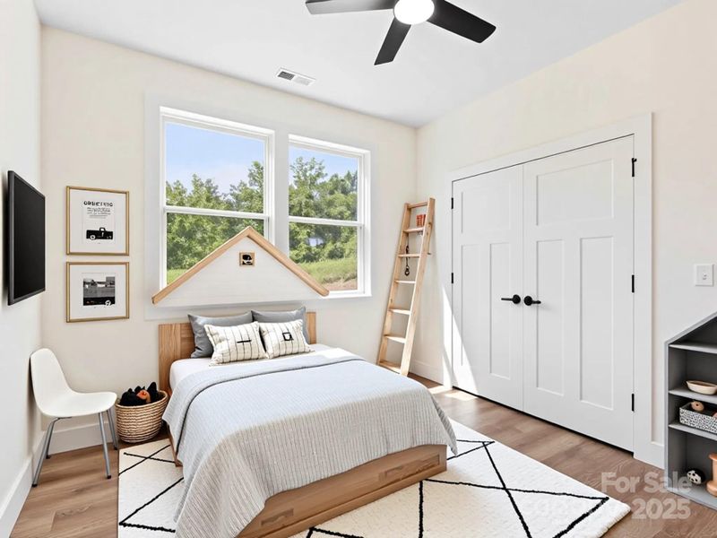 Virtually staged hall bedroom.