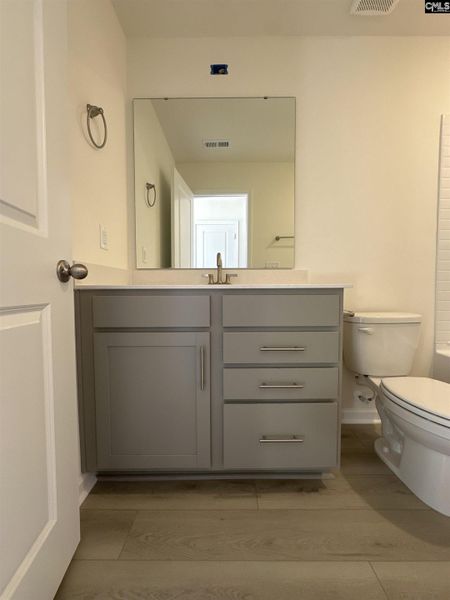 Furnished interior view inside a new home in Piney Woods Bluff, Columbia (Image 3). Furnished interior view inside a new home in Piney Woods Bluff, Columbia (Image 3).