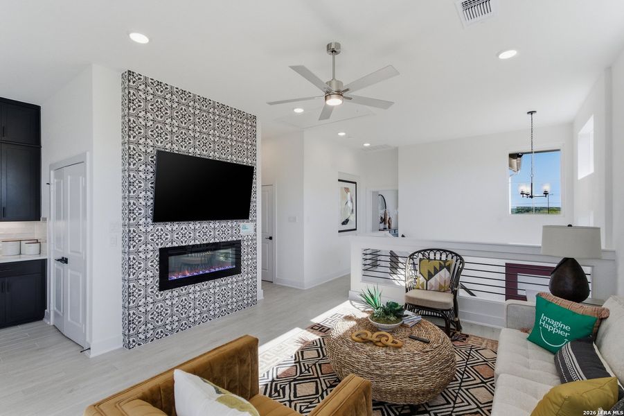 Furnished interior view inside a new home in Centero at Stone Oak, San Antonio (Image 27).