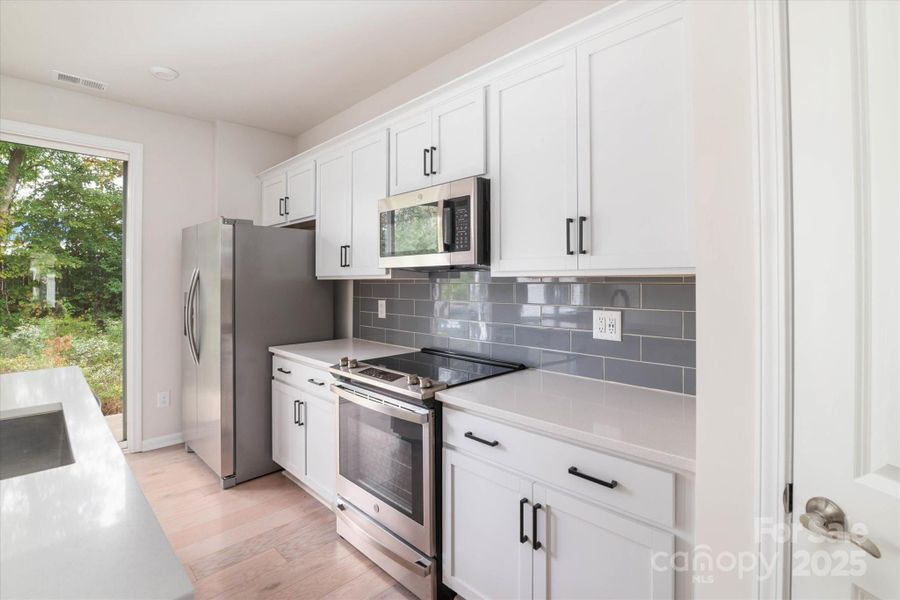 Furnished interior view inside a new home in , Charlotte (Image 13).