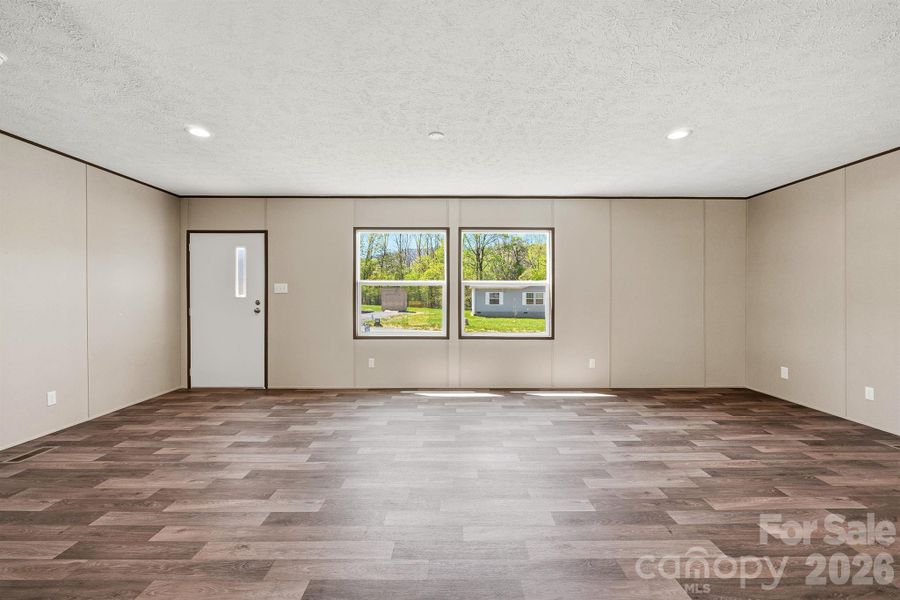 Spacious, unfurnished interior of a new home in , Old Fort (Image 18).