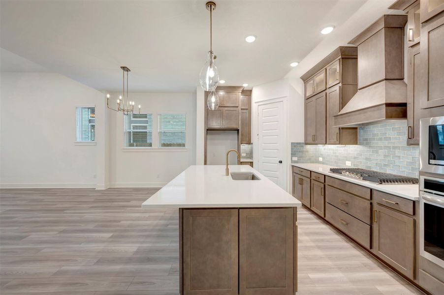 Furnished interior view inside a new home in Elyson 45', Katy (Image 3).