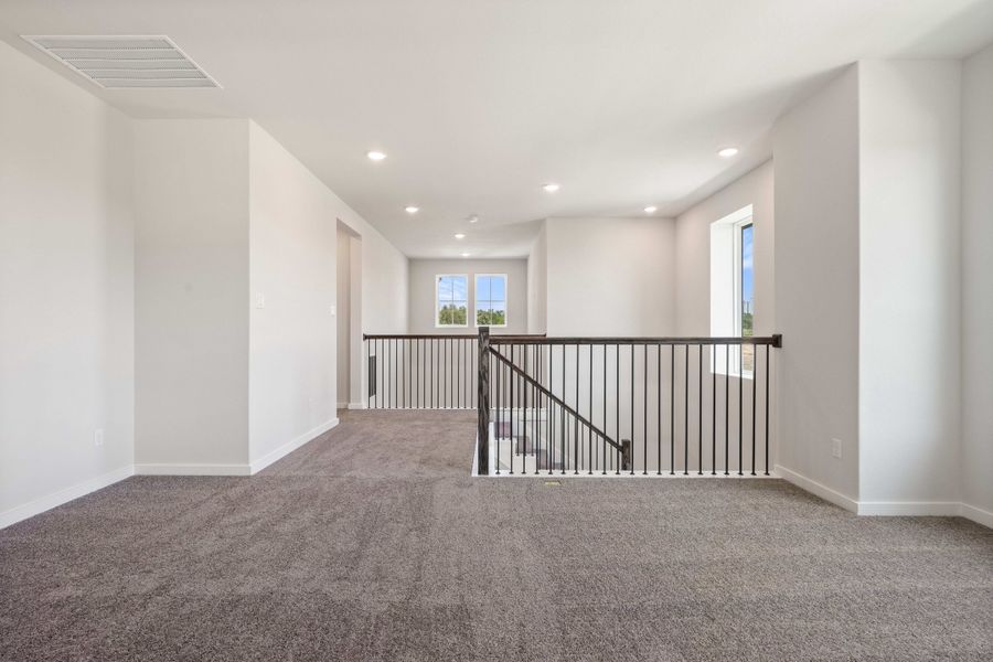 Spacious, unfurnished interior of a new home in Wolf Ranch, Georgetown (Image 42).